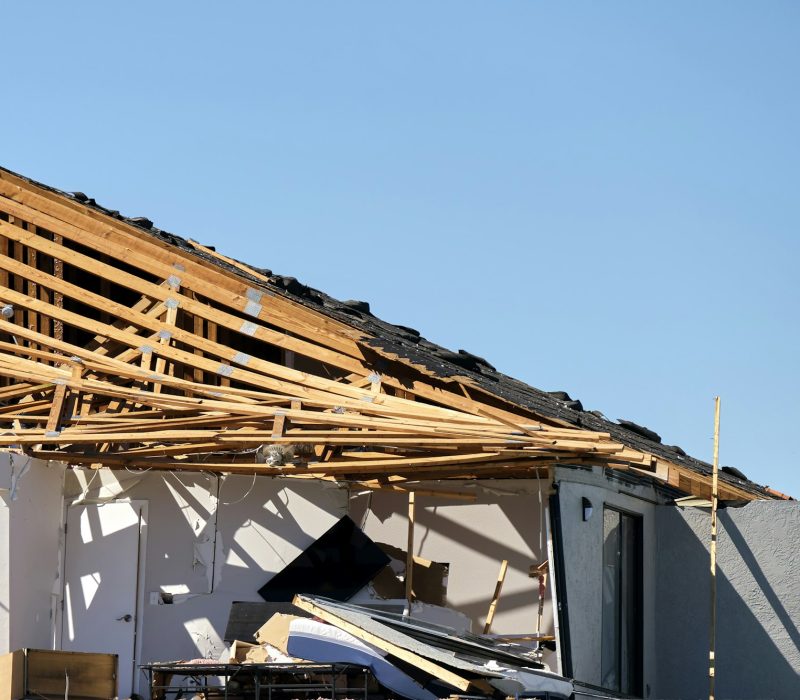 Badly damaged mobile home after hurricane Ian in Florida residential area.