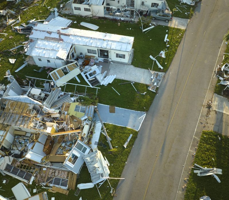 Severely damaged by hurricane Ian houses in Florida mobile home residential area.