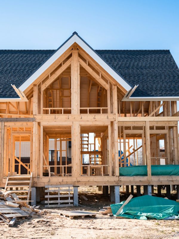 Wooden house frame construction. Manufacture of houses made of wood.